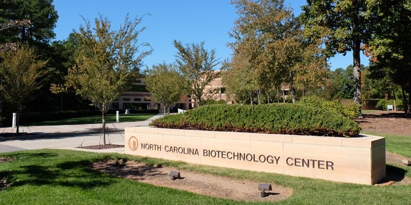 North Carolina Biotechnology Center name on a brick sign.